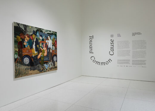 Gallery entry featuring a large comic painting and wall text.