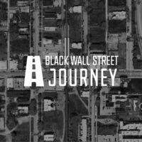The words Black Wall Street Journey overlaid on a satellite map of a city block